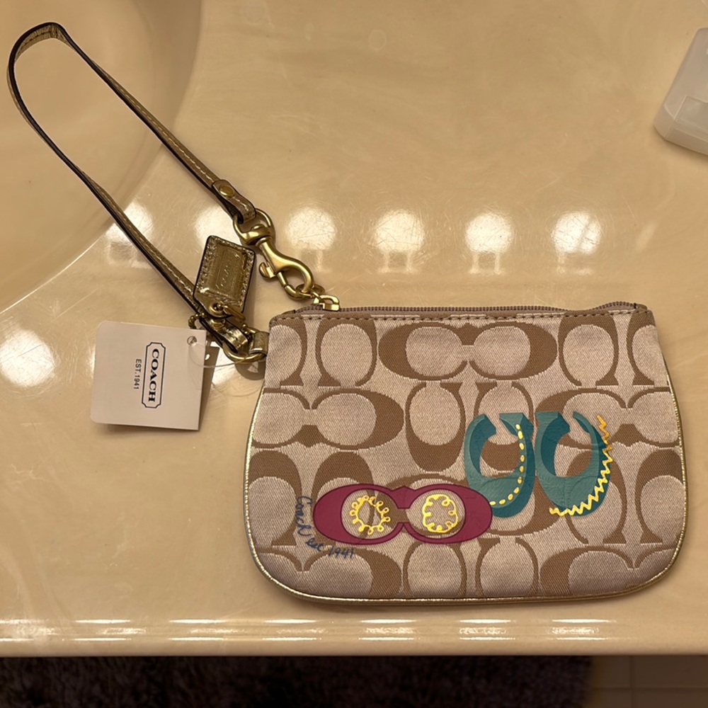 Coach Beige Wristlet with Pink and Yellow Accents